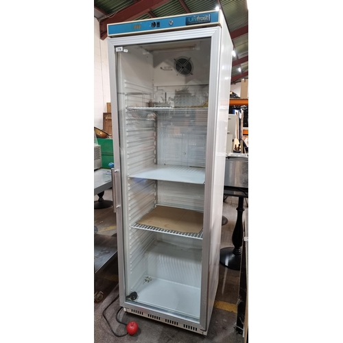 778 - Star lot : A commercial grade Unifrost upright chiller, model Unifrost GDR400. With three shelves an... 