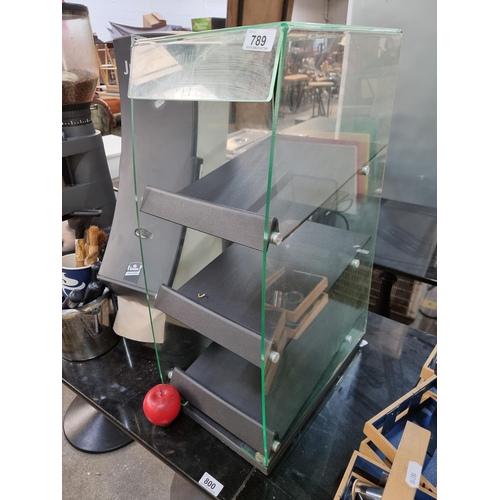 789 - A commercial product display case with three removable shelves and clear case open to front and back... 