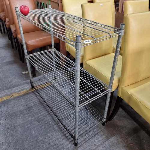 795 - A galvanized steel three tier shelf liner. From a recently closed modern cafe.