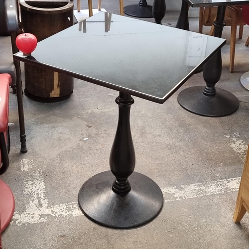 797 - Star Lot : A very high quality granite top rectangular cafe/bistro table with a circular cast iron b... 