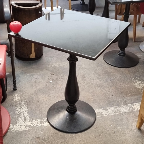 800 - Star lot : A high quality granite top rectangular cafe/bistro table with a circular cast iron base. ... 