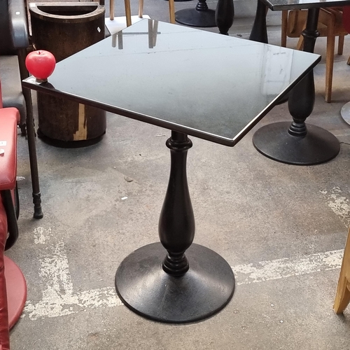 803 - Star Lot : A high quality granite top rectangular cafe/bistro table with a circular cast iron base. ... 