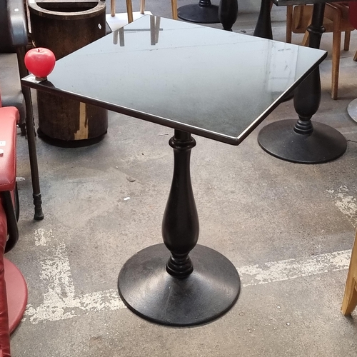 805 - Star lot : A high quality granite top rectangular cafe/bistro table with a circular cast iron base. ... 