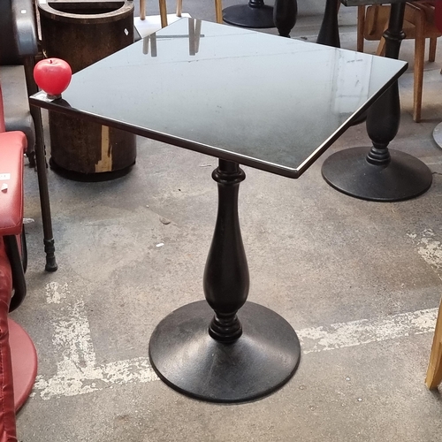 806 - Star Lot : A high quality granite top rectangular cafe/bistro table with a circular cast iron base. ... 