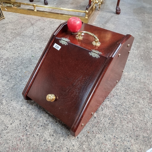 839 - A handsome dark mahogany coal bucket with brass handles and hinges.  In really lovey condition.