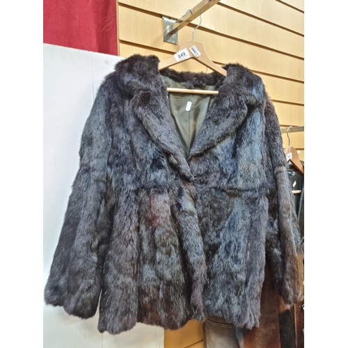 849 - An elegant vintage genuine fur jacket with two fastenings to front and two pockets. To fit a women's... 