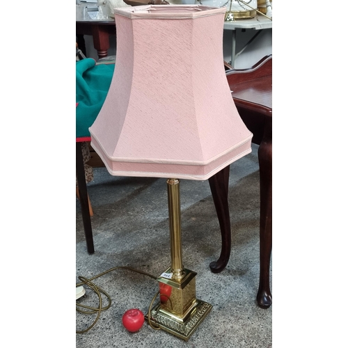 864 - A beautiful tall floor/table lamp with an elegant brass base and salmon pink shade. H105cm From a fa... 