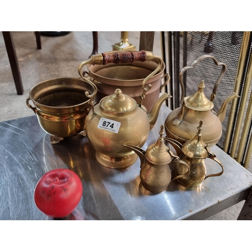 874 - A selection of 6 brass items including ornate teapots and planters.