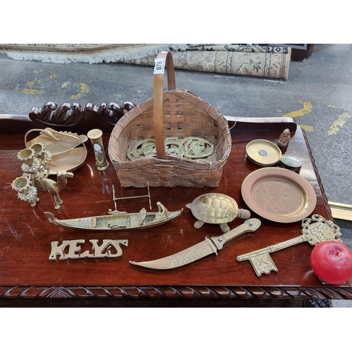 878 - A great selection of approx. 15 brass collectables including an ornate letter opener, ring dishes wi... 