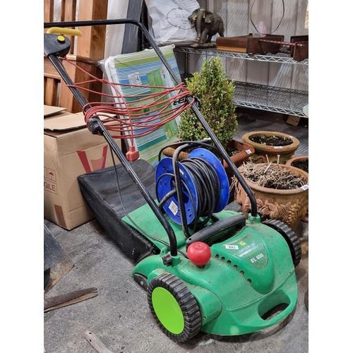 893 - Two items consisting of a Gardenline EL 600 lawnmower and a 25 metre extension lead.