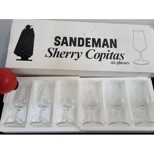 902 - A set of 6 Sandeman Sherry Copitas glasses with original box. In very good condition.