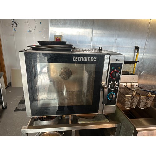 818 - Star Lot : Technoinox Gas commercial oven, On an oven stand with tray storage. There is interior Gri... 