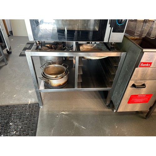 818 - Star Lot : Technoinox Gas commercial oven, On an oven stand with tray storage. There is interior Gri... 