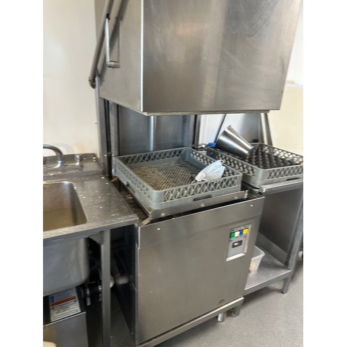 824 - Star lot : A full size pull down Stainless Steel Dish washer, 3 Phase. With dishwasher trays and sid... 