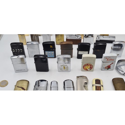 18 - A very large collection of 35 cigarette lighters, some flint others gas, items as per photograph. In... 