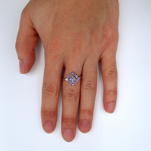 617 - Star Lot : An attractive tazanite stone cluster ring mounted in 9K gold (375), size P, weight 2.33 g... 