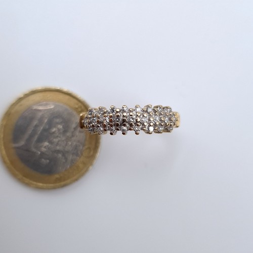 618 - Star lot : A nice example of a 9K gold (375) diamond ring in channel cut setting, ring size N, weigh... 