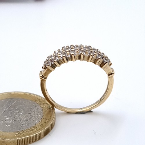 618 - Star lot : A nice example of a 9K gold (375) diamond ring in channel cut setting, ring size N, weigh... 