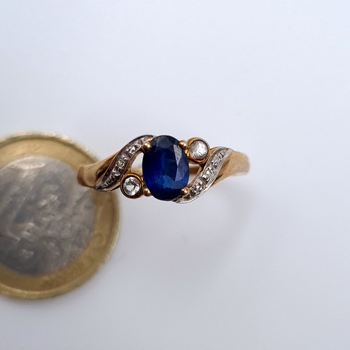 619 - Star Lot : A nice example of a blue sapphire stone ring with gemstone twist mount setting, size Q, w... 