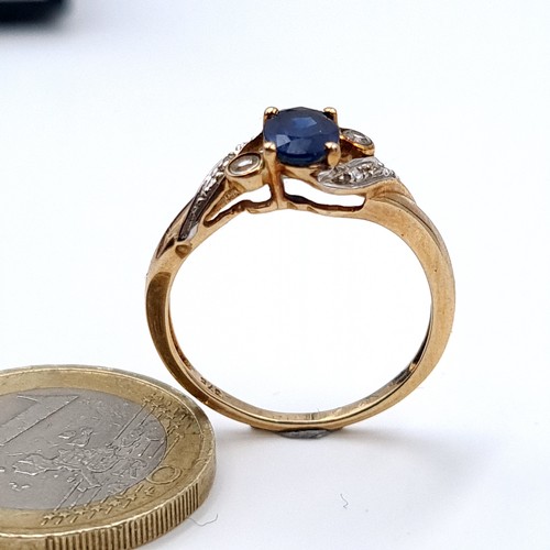 619 - Star Lot : A nice example of a blue sapphire stone ring with gemstone twist mount setting, size Q, w... 