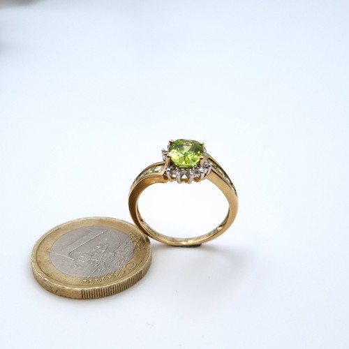 627 - Star lot : A nice example of a 9K gold peridot stone ring with twist diamond set mount, ring size O,... 