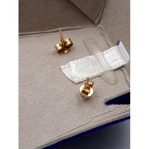 644 - A pair of hallmarked 9K gold Sapphire stud earrings for pierced ears,