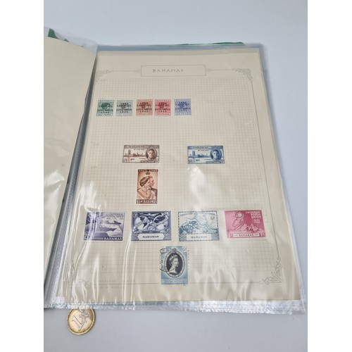 648 - A collection of British commonwealth stamp album containing a fine group of ten mint and used pages ... 