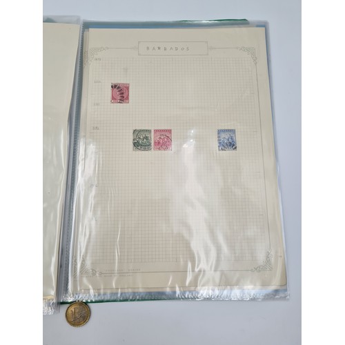 648 - A collection of British commonwealth stamp album containing a fine group of ten mint and used pages ... 