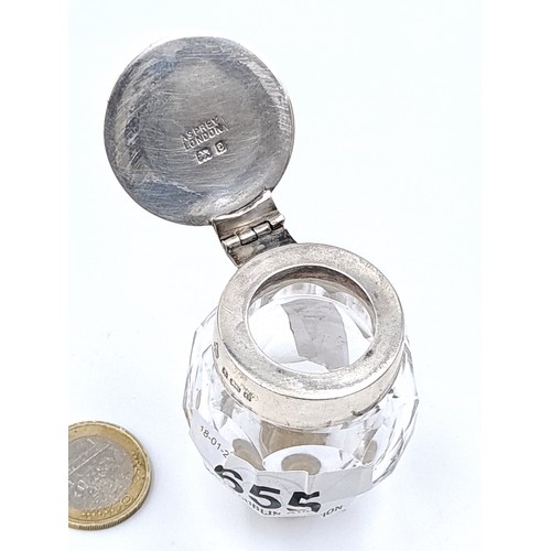 655 - A pretty cut glass bottle stopper with sterling silver collar and lid marked by Asprey of London C.1... 