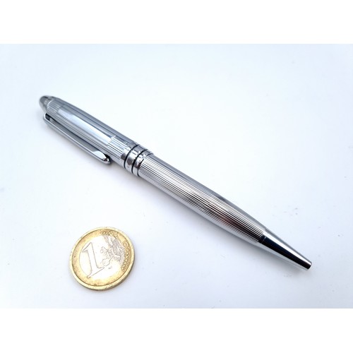 659 - A Newbridge silverware ballpoint pen in a brushed chrome finished presented in original box.