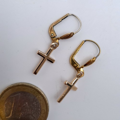 663 - A pair of 9 kt cross pendant earrings suitable for pierced ears, weight  Boxed.