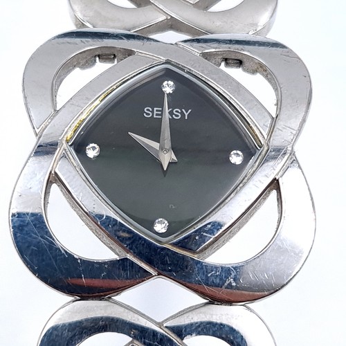 696 - A sekonda wristwatch with abaloney dial and gemstone setting together with two Sterling silver rings... 