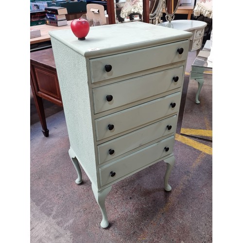 399 - A charming dresser with five drawers held on cabriole legs. In a delicate turquoise finish.