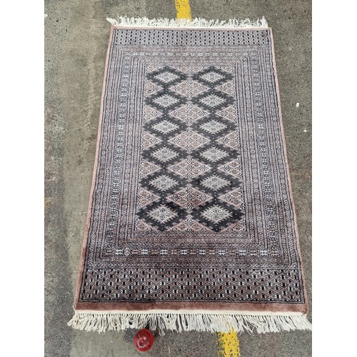 466 - Star Lot : A fabulous hand knotted woolen Persian style rug boasting an intricate geometric pattern ... 