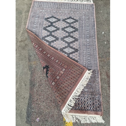 466 - Star Lot : A fabulous hand knotted woolen Persian style rug boasting an intricate geometric pattern ... 