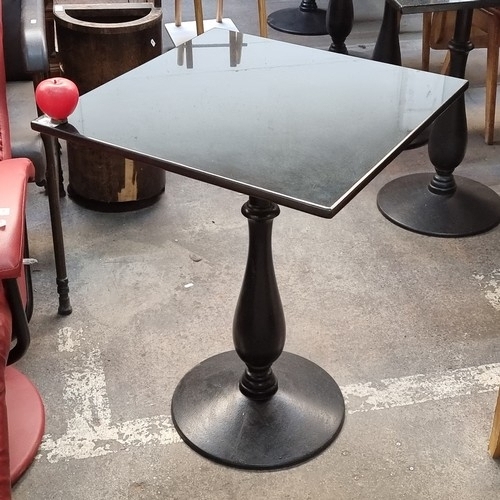 808 - Star lot : A high quality granite top rectangular cafe/bistro table with a circular cast iron base. ... 