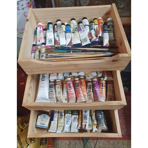 370 - Two artists boxes pack full of paint tubes and brushes. Mostly consisting of Winsor and Newton. This... 