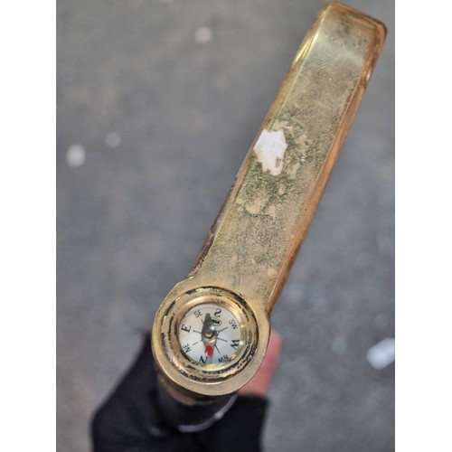 213 - A fabulous vintage walking stick / cane with thick brass handle, boasting an inlaid compass to top.