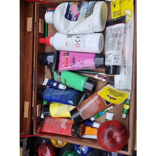 370 - Two artists boxes pack full of paint tubes and brushes. Mostly consisting of Winsor and Newton. This... 