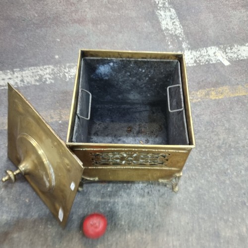 425 - Star Lot : An exquisite antique brass coal box with removable liner, lid featuring a finial and foli... 