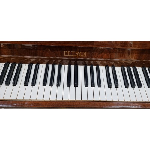 840 - Star lot : A fabulous Petrof Steel framed overstrung Piano. In fantastic condition with a matching p... 