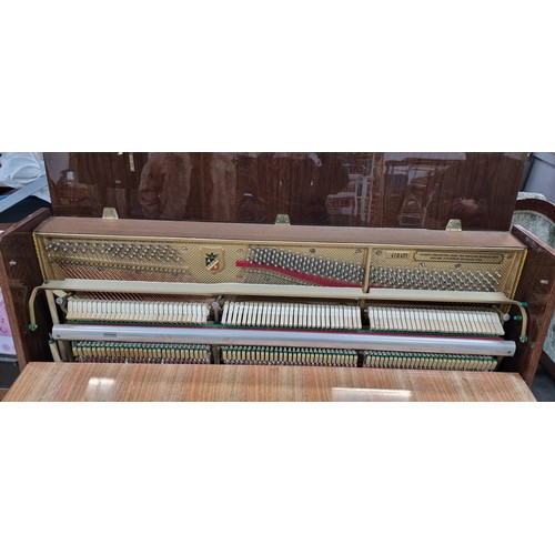 840 - Star lot : A fabulous Petrof Steel framed overstrung Piano. In fantastic condition with a matching p... 