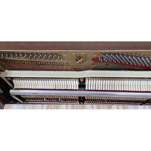 840 - Star lot : A fabulous Petrof Steel framed overstrung Piano. In fantastic condition with a matching p... 