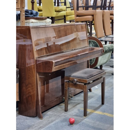 840 - Star lot : A fabulous Petrof Steel framed overstrung Piano. In fantastic condition with a matching p... 