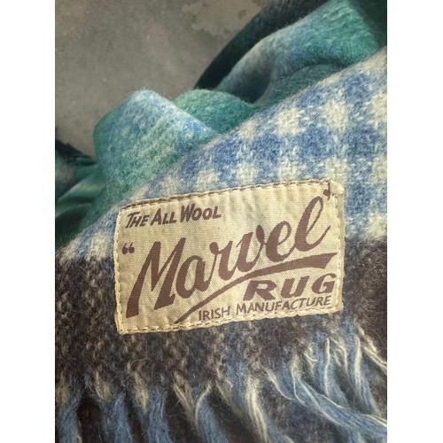 101 - Two large vintage Irish wool blankets including a Connemara example and another from Marvel Rug. Fea... 