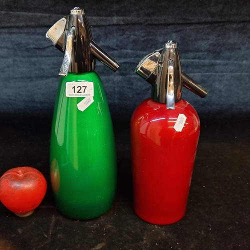 127 - Two vintage metal siphons from the brands BOC and Sparklets Ltd. In red and green.