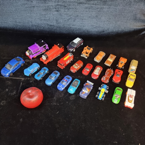 151 - A collection of approx. 24 model cars and models including retro examples from Corgi and Hot Wheels ... 