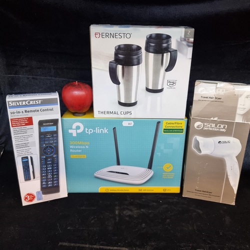 152 - Four items including a brand new TP-Link 300Mbps Wireless N Router, a Salon Perfection Daily hair dr... 