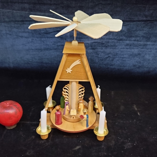 162 - A very unusual carousel Christmas Nativity Scene crafted from wood. Featuring windmill to top, colou... 