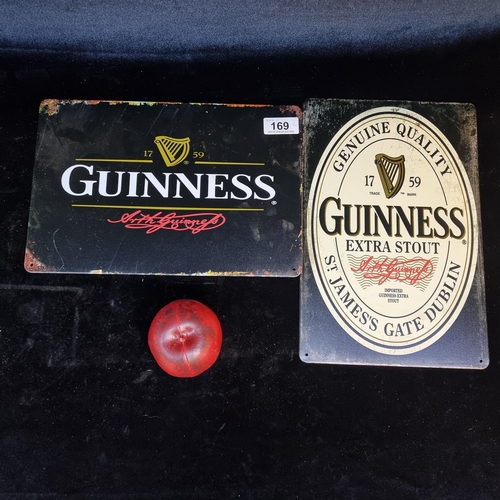 169 - Two metal Guinness advertising signs.